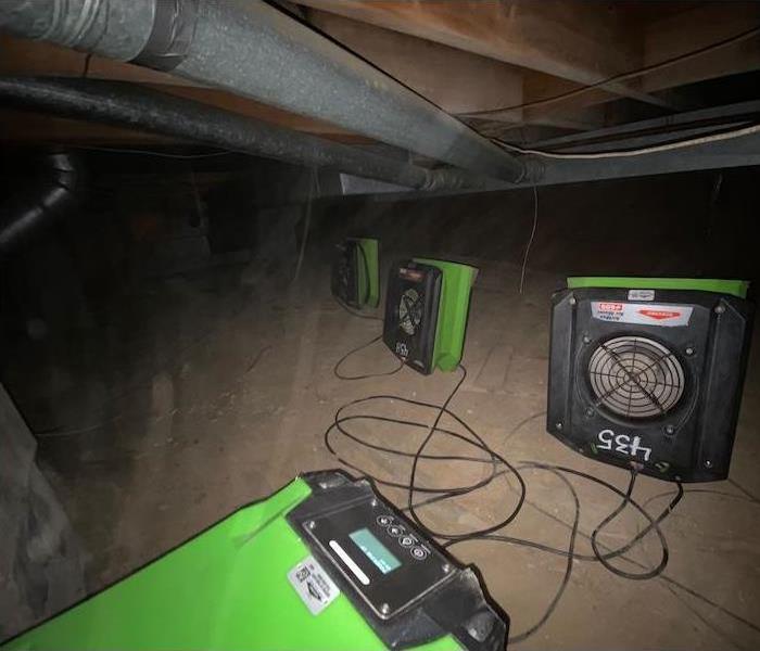 SERVPRO drying equipment in crawl space